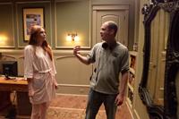 OCULUS, from left: Karen Gillan, director Mike Flanagan, on set, 2013. ph: John Estes/©Relativity Media