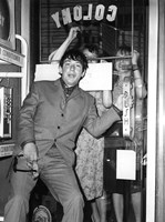 ERIC BURDON, MOBBED BY TEENAGE FANS, SEEKS REFUGE INSIDE MANHATTAN'S FAMED COLONY RECORD STORE, 9/2/64