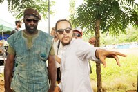 BEASTS OF NO NATION, from left: Idris Elba, director Cary Joji Fukunaga, on set, 2015. ©Bleecker Street Media