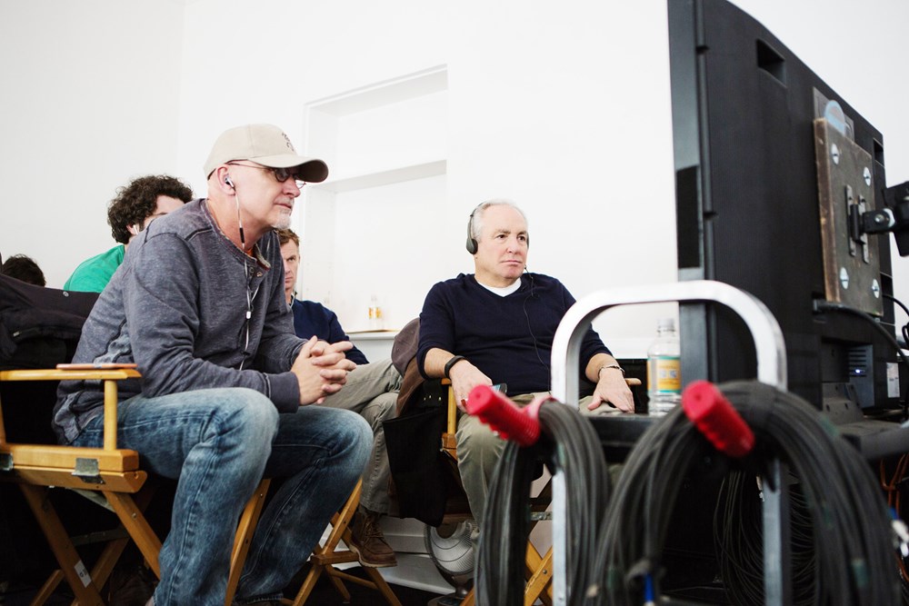WHISKEY TANGO FOXTROT, foreground from left: producers Ian Bryce, Lorne Michaels, on set, 2016. ph: Frank Masi/© Paramount Pictures