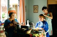 VOLVER, Lola Duenas (standing, far right), 2006. ©Sony Pictures Classics