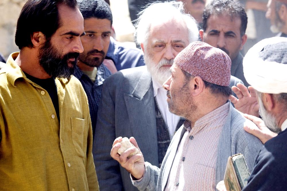 THE STONING OF SORAYA M., Navid Negahban (left), Parviz Sayyad (right), 2008. ©Roadside Attractions