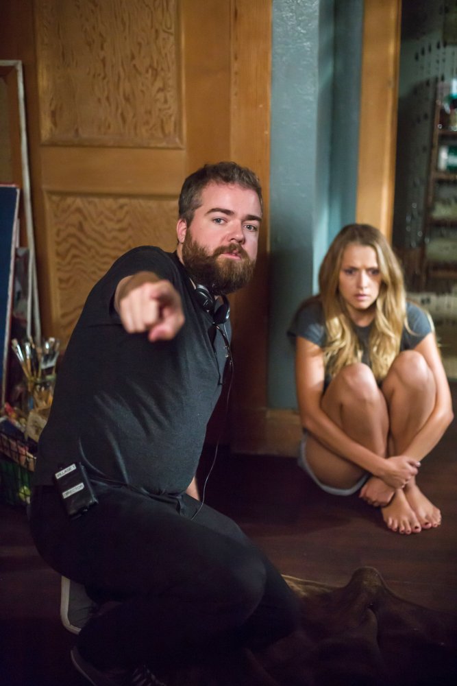 LIGHTS OUT, from left: director David F. Sandberg, Teresa Palmer, on set, 2016. ph: Ron Batzdorff/© Warner Bros.