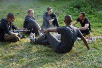 MADE IN FRANCE, l-r: Nassim Si Ahmed, Malik Zidi, Francois Civil, Dimitri Storoge, back to camera: Ahmed Drame, 2015. ©Distrib Films