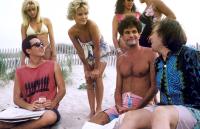 ONE CRAZY SUMMER, John Cusack (front), Kimberly Foster (center), Tom Villard (front), Bobcat Goldthwait (front), 1986. ©Warner Bros.