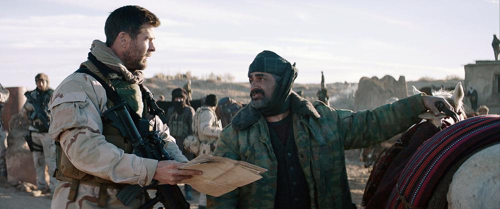 12 STRONG, FROM LEFT: CHRIS HEMSWORTH, NAVID NEGAHBAN, 2018. © WARNER BROS. PICTURES