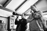 HEREDITARY, FROM LEFT: DIRECTOR ARI ASTER, CINEMATOGRAPHER PAWEL POGORZELSKI, ON SET, 2018. PH: JAMES MINCHIN/© A24