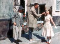 MON ONCLE, (aka MY UNCLE), Jacques Tati (center), Betty Schneider (right), 1958