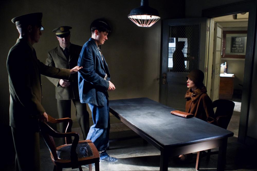 CHANGELING, Jason Butler Harner (standing at table), Angelina Jole (seated right), 2008, © Universal