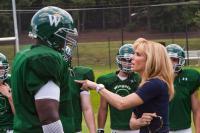 THE BLIND SIDE, foreground from left: Quinton Aaron, Sandra Bullock, 2009. Ph: Ralph Nelson/©Warner Bros.