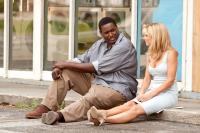 THE BLIND SIDE, from left: Quinton Aaron, Sandra Bullock, 2009. Ph: Ralph Nelson/©Warner Bros.
