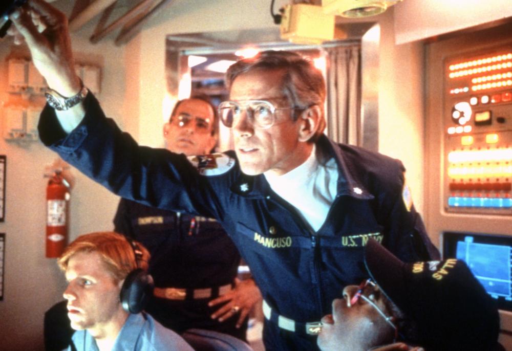 THE HUNT FOR RED OCTOBER, Ned Vaughn, Anthony Peck (background), Scott Glenn (front, center), Courtney Vance (lower right), 1990. ©Paramount