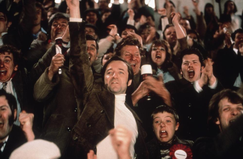 FEVER PITCH, Neil Pearson (raised arm), 1997, © Phaedra Cinema