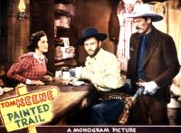 THE PAINTED TRAIL, from left: Eleanor Stewart, Tom Keene, Glenn Strange, 1938