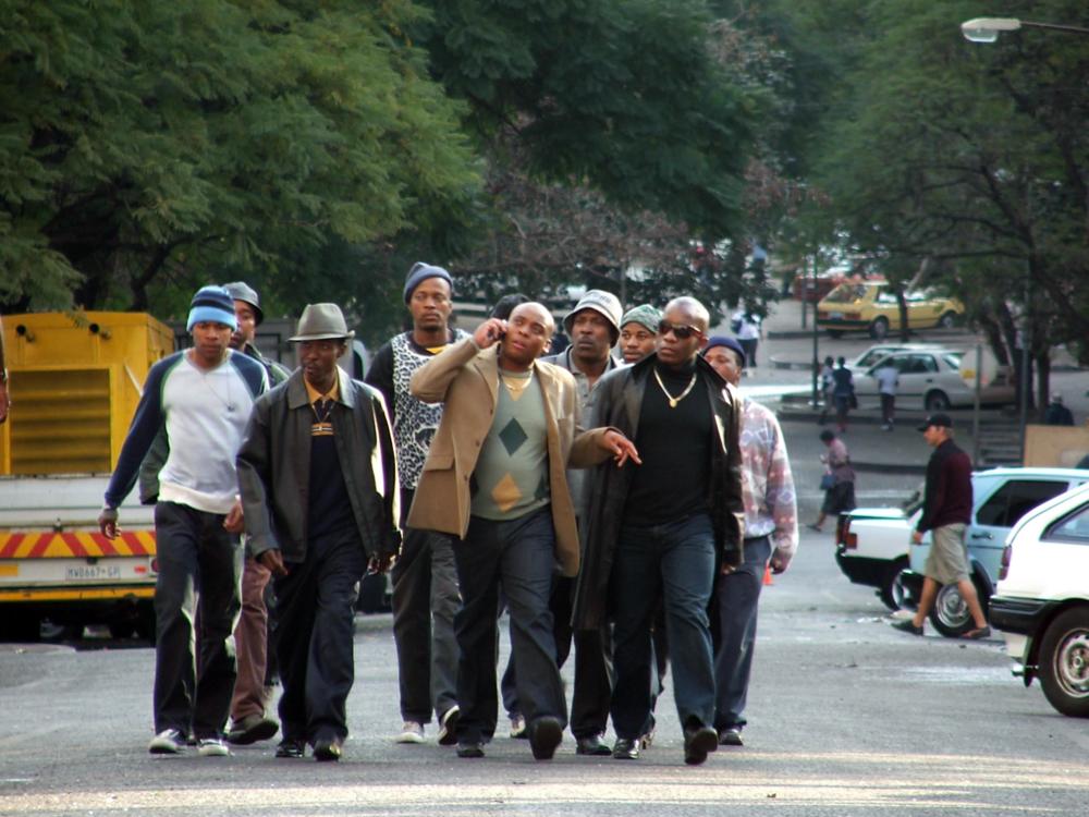 GANGSTER'S PARADISE: JERUSALEMA, (aka JERUSALEMA), Ronnie Nyakale (front, second from left), Rapulana Seiphemo (center), Patrick Mofokeng (right of center, with hat), Jeffrey Sekele (front right), 2008. ph: Jonathan Burger/©Anchor Bay Entertainment