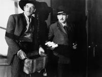 WESTERN CYCLONE, from left: Glenn Strange, Charles King, 1943