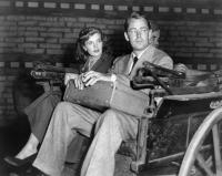 THUNDER IN THE EAST, from left, Corinne Calvet, Alan Ladd, on-set, 1952