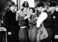 SWEATER GIRL, embracing from left: June Preisser, Eddie Bracken, William Henry (holding jacket), 1942