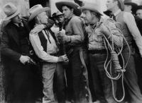THE MYSTERIOUS RIDER, front from left: Monte Blue, Earl Dwire, Glenn Strange, Sidney Toler, Jack Rockwell, 1938