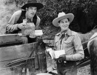 LAND OF THE SIX GUNS, from left: Glenn Strange, Jack Randall, 1940
