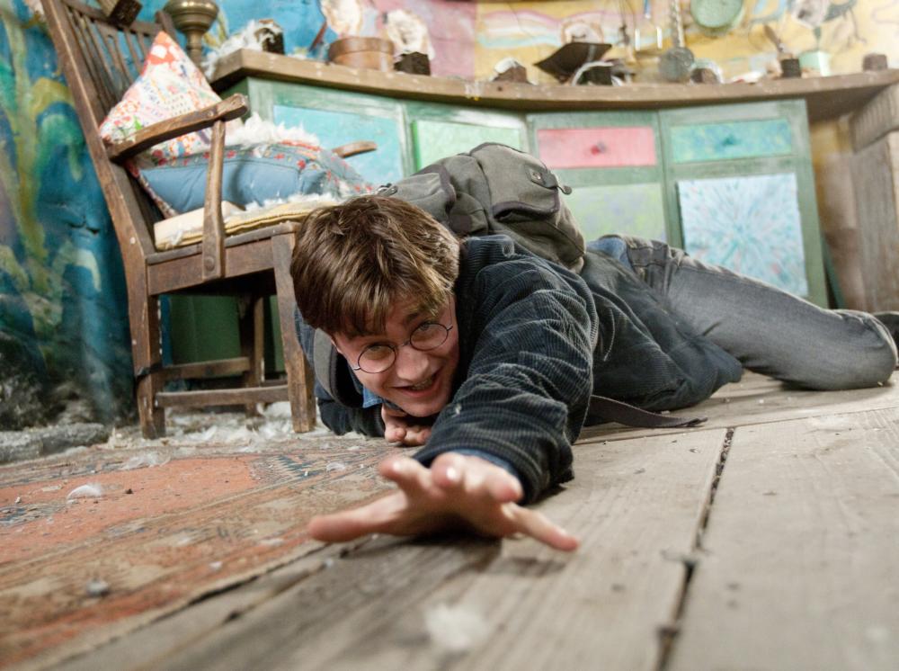 HARRY POTTER AND THE DEATHLY HALLOWS: PART 1, Daniel Radcliffe, 2010. ph: Jaap Buitendijk/©2010 Warner Bros. Ent. Harry Potter publishing rights ©J.K.R. Harry Potter characters, names and related indicia are trademarks of and ©Warner Bros. Ent. All rights