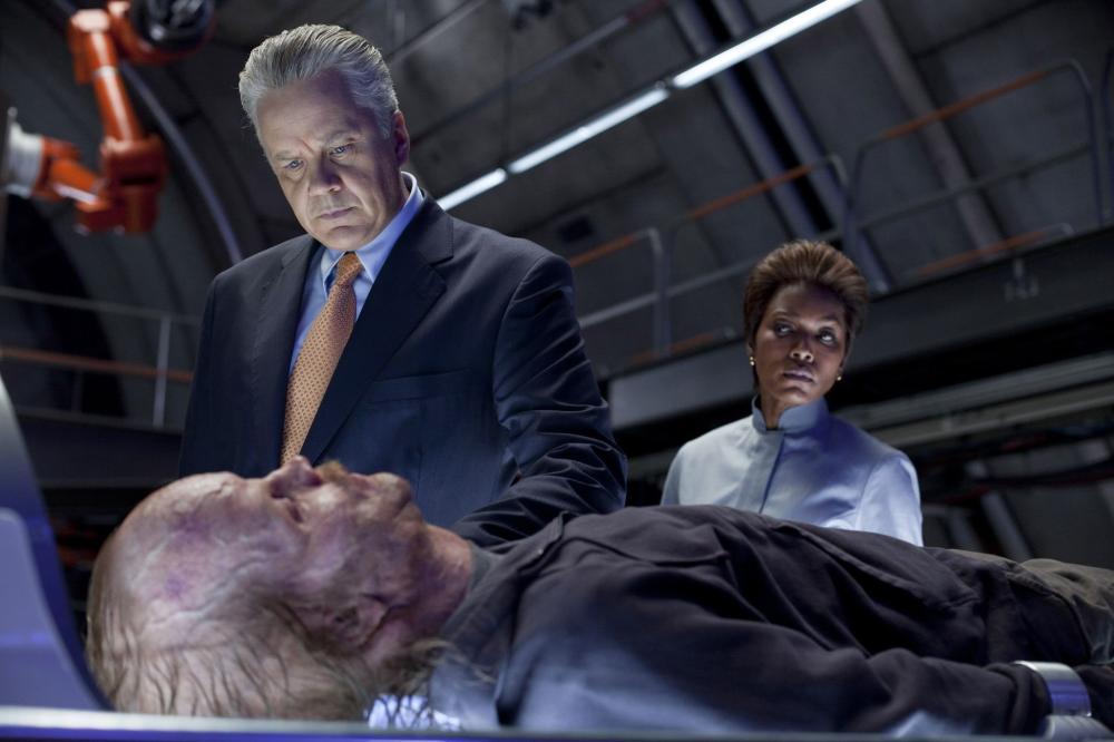 GREEN LANTERN, from left: Peter Sarsgaard (front), Tim Robbins, Angela Bassett, 2011. ph: Francois Duhamel/©Warner Bros. Pictures