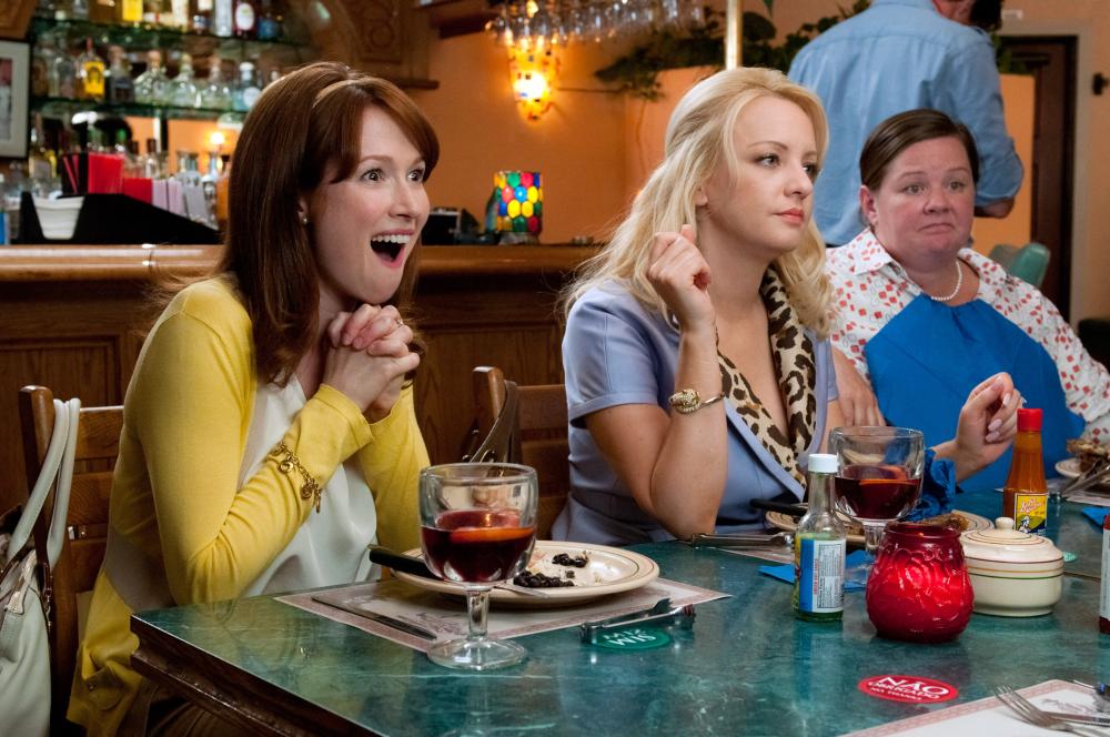 BRIDESMAIDS, from left: Ellie Kemper, Wendi McLendon-Covey, Melissa McCarthy, 2011. ph: Suzanne Hanover/©Universal Pictures
