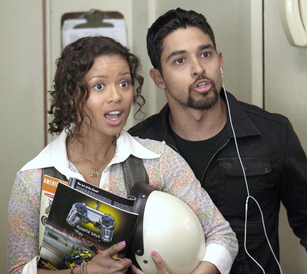 LARRY CROWNE, from left: Gugu Mbatha-Raw, Wilmer Valderrama, 2011. ©Universal Pictures