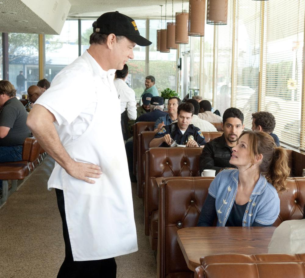 LARRY CROWNE, Tom Hanks, Julia Roberts, Wilmer Valderrama (back right), 2011. ©Universal Pictures