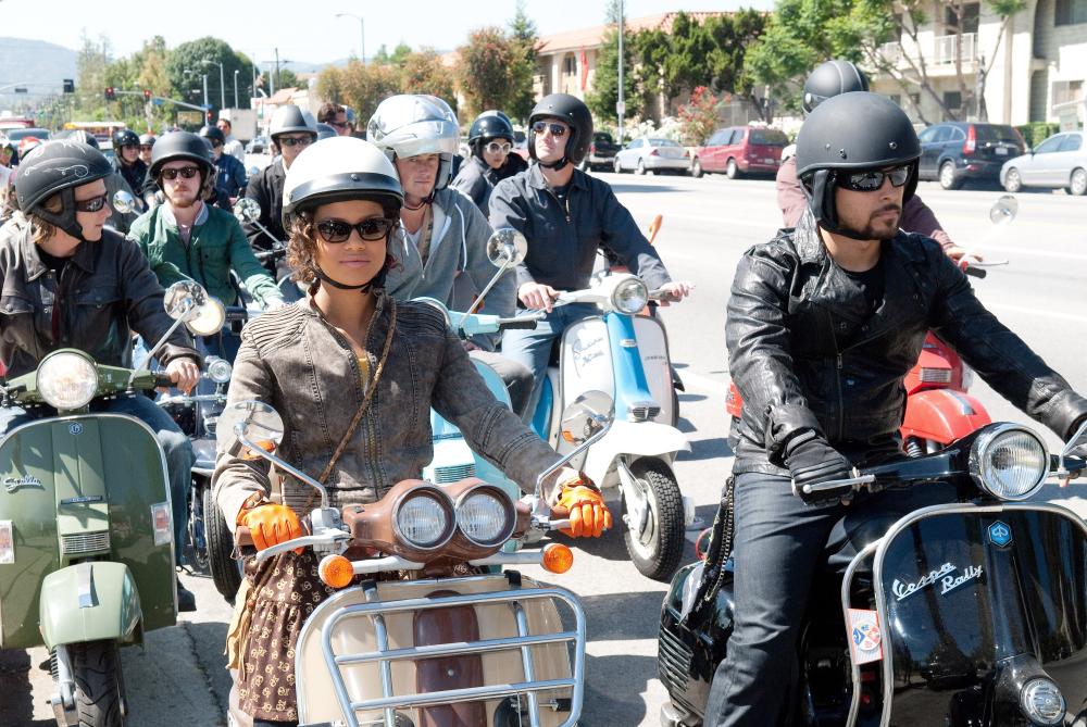 LARRY CROWNE, from left: Gugu Mbatha-Raw, Wilmer Valderrama, 2011. ©Universal Pictures
