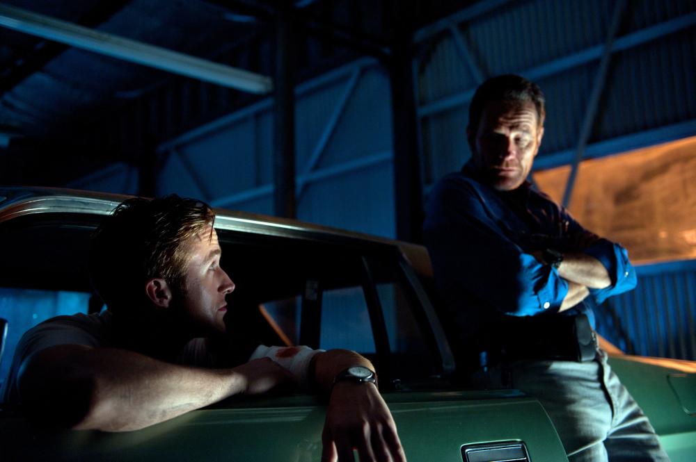 DRIVE, from left: Ryan Gosling, Bryan Cranston, 2011. ph: Richard Foreman Jr/©FilmDistric