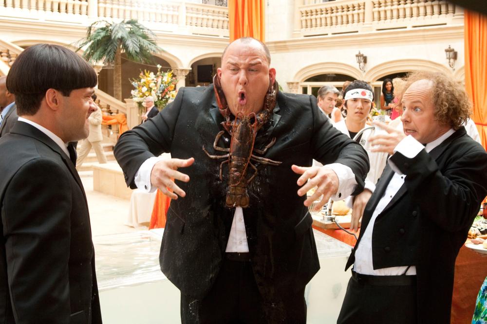 THE THREE STOOGES, from left: Chris Diamantopoulos as Moe, Will Sasso as Curly, Sean Hayes as Larry, 2012. ph: Peter Iovino/TM & copyright ©20th Century Fox Film Corp. All rights reserved