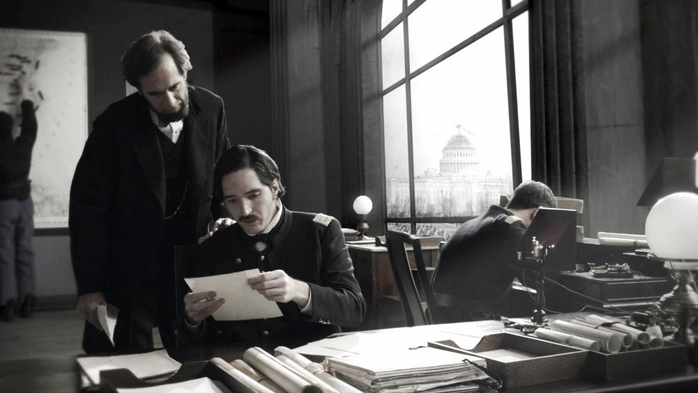 SAVING LINCOLN, from left: Tom Amandes, as Abraham Lincoln, David Dastmalchian, 2012.