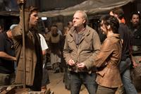 THE HUNGER GAMES: CATCHING FIRE, from left: Liam Hemsworth, director Francis Lawrence, Jennifer Lawrence, on set, 2013. ph: Murray Close/©Lionsgate