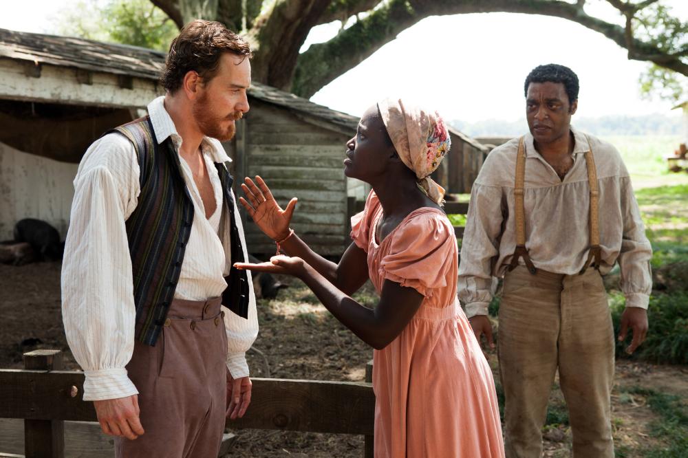 12 YEARS A SLAVE, from left: Michael Fassbender, Lupita Nyong'o, Chiwetel Ejiofor, 2013. ph: Francois Duhamel/TM and copyright ©Fox Searchlight Pictures. All rights reserved.
