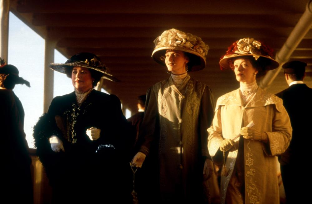 TITANIC, Kathy Bates, Kate Winslet, Frances Fisher, 1997, ship's deck. TM and Copyright (c) 20th Century Fox Film Corp. All rights reserved..