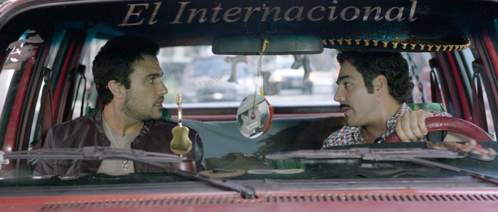 PULLING STRINGS, from left: Jaime Camil, Omar Chaparro, 2013. ©Lionsgate