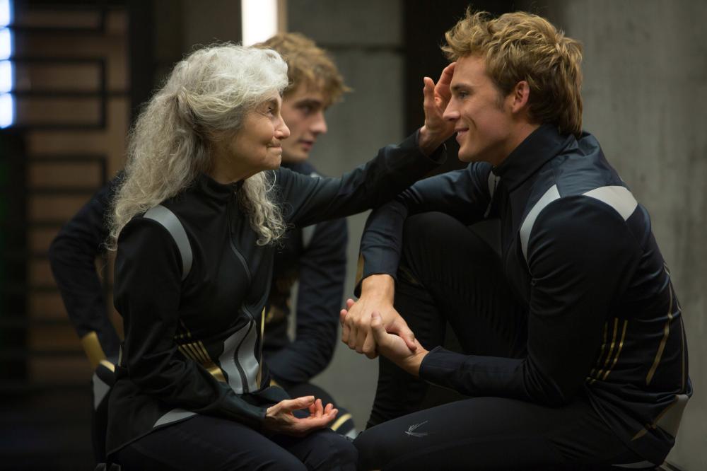 THE HUNGER GAMES: CATCHING FIRE, from left: Lynn Cohen, Sam Claflin, 2013. ph: Murray Close/©Lionsgate