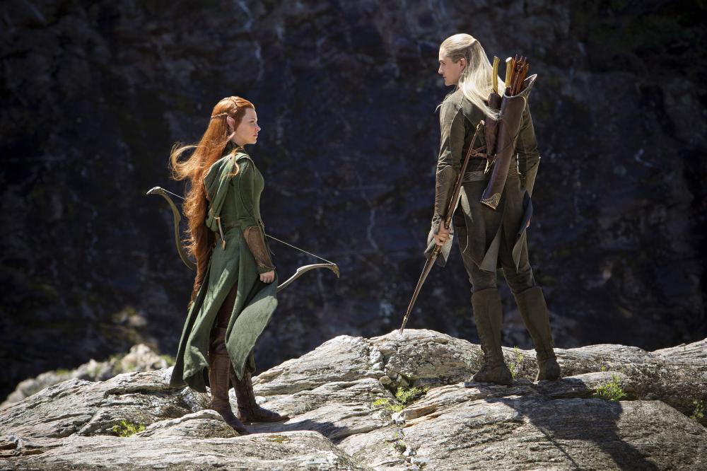 THE HOBBIT: THE DESOLATION OF SMAUG, from left: Evangeline Lilly, Orlando Bloom, 2013. ph: James Fisher/©Warner Bros. Pictures