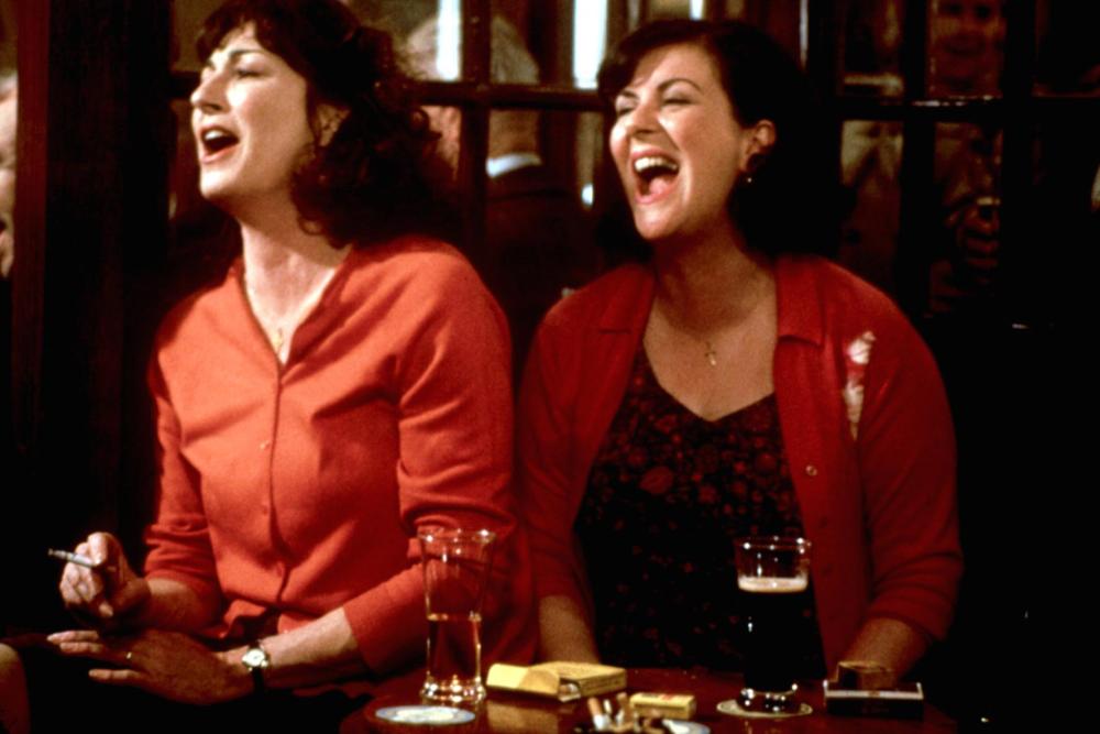AGNES BROWNE, Anjelica Huston, Marion O'Dwyer, 1999, laughing at the pub