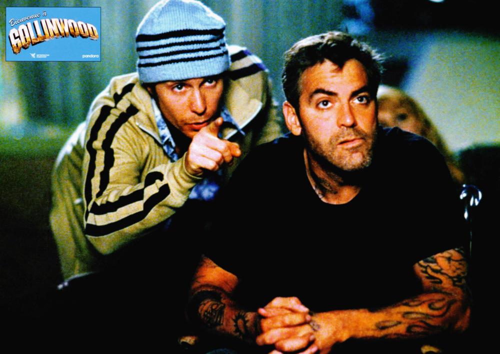 WELCOME TO COLLINWOOD, (aka BIENVENUE A COLLINWOOD), from left: Sam Rockwell, George Clooney, 2002, © Warner Brothers