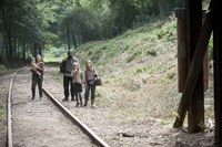 The Walking Dead, from left: Melissa McBride, Chad L Coleman, Kyla Kenedy, Brighton Sharbino, 'Inmates', Season 4, Ep. #10, 02/16/2014, ©AMC